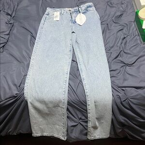 Light Blue Denim Jeans

Ms. Fonda High-Rise Wide-Leg Jeans
 SIZE 25